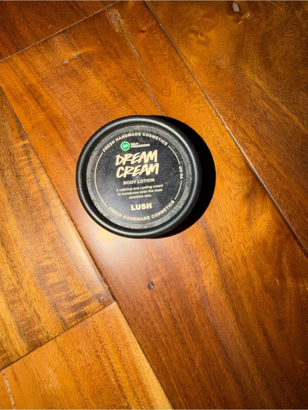 Small jar of lush dream cream body lotion